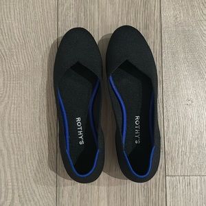 Black Rothy flats in great condition.